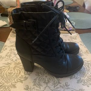 G by Guess black high-heeled combat boots. Super comfortable.